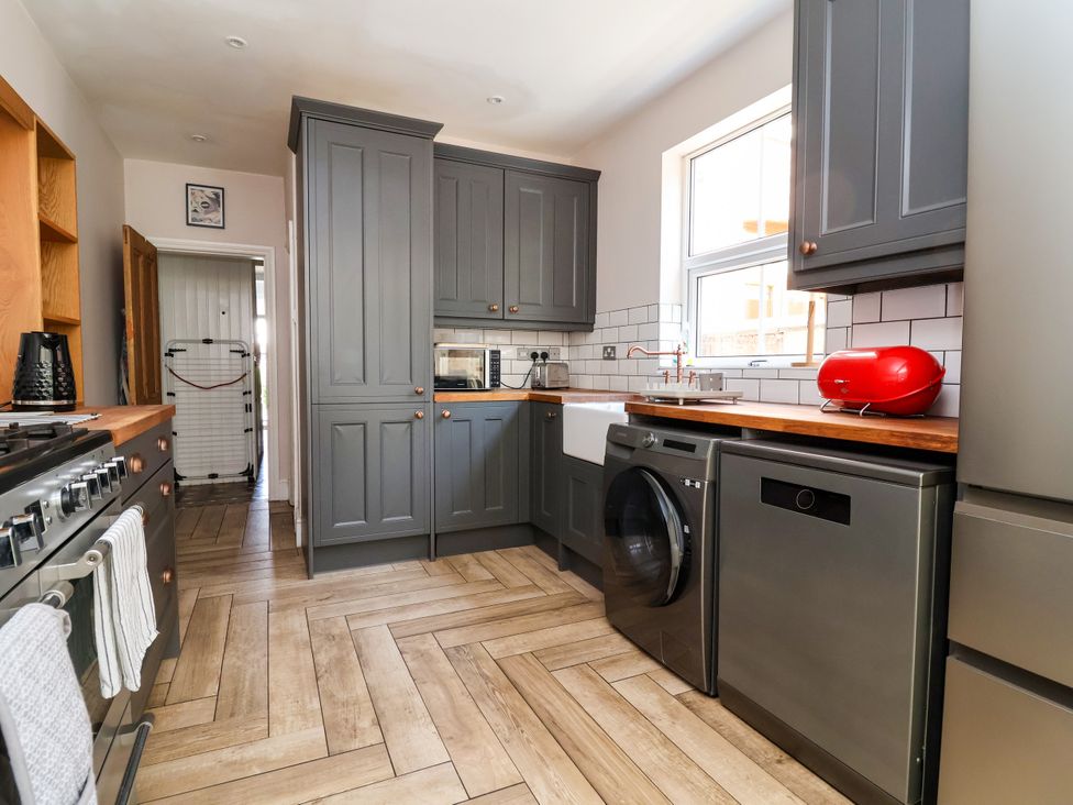 A kitchen with cabinets, appliances and countertop at 45 Brook Lane in Chester