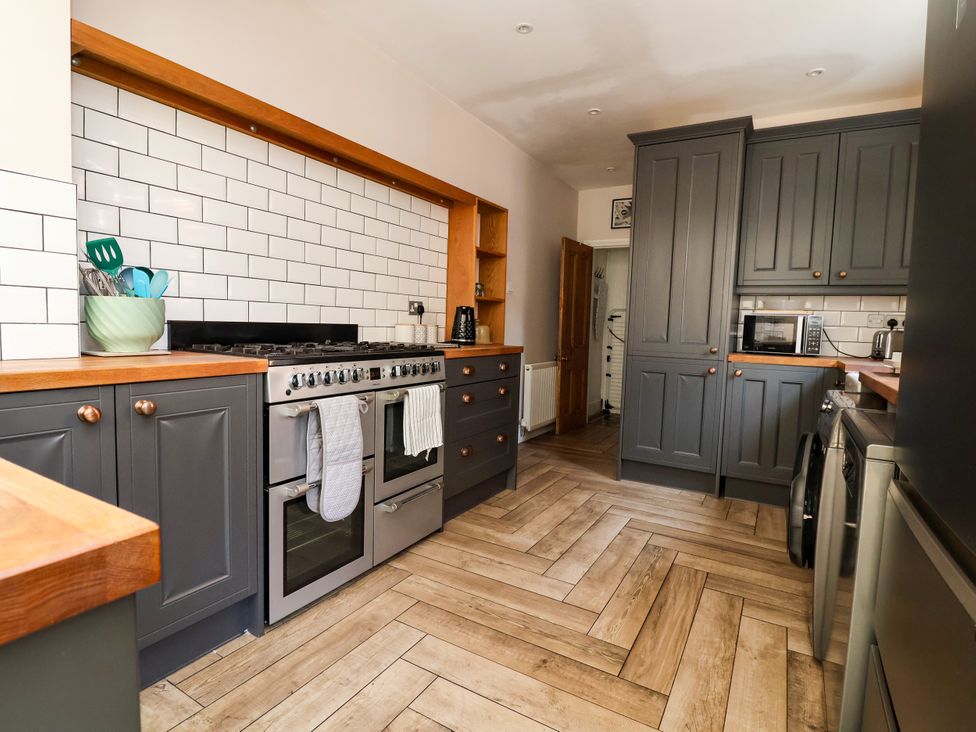 A kitchen with cabinets and appliances at 45 Brook Lane Chester