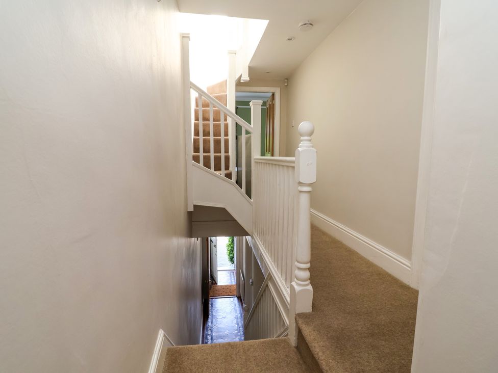 A staircase and hallway at 45 Brook Lane Chester