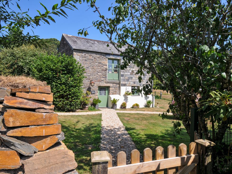 A house with a pathway and garden at The Mill in Lostwithiel
