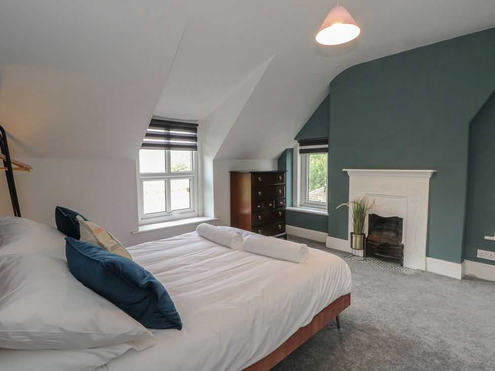 A bedroom with a bed and a chest of drawers at Montclair in Buxton