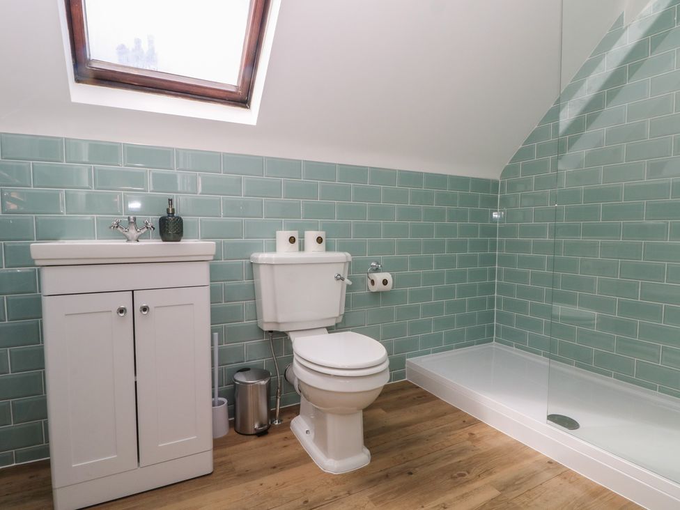 A bathroom with a sink and toilet at Montclair in Buxton