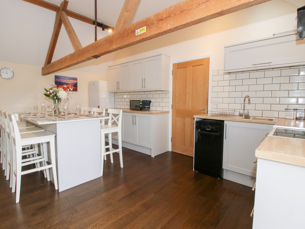 A kitchen with countertop and appliances at Millstone Cottages - Breidden View in Westbury