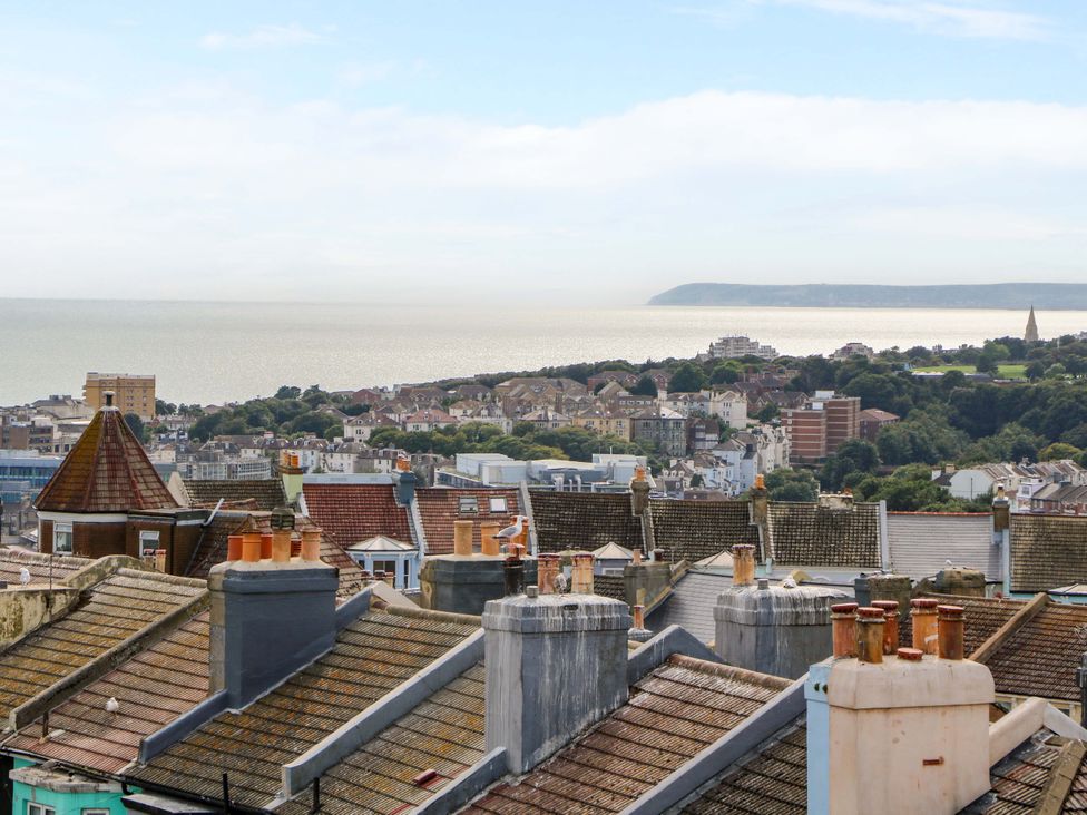 A view of rooftops and the sea at Hasting Heights in Hastings
