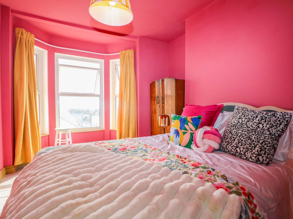 A bedroom with a bed and pillows at Hasting Heights in Hastings