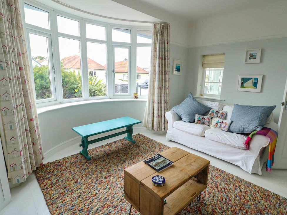 A living room with a sofa and coffee table at Gorse Hill in 