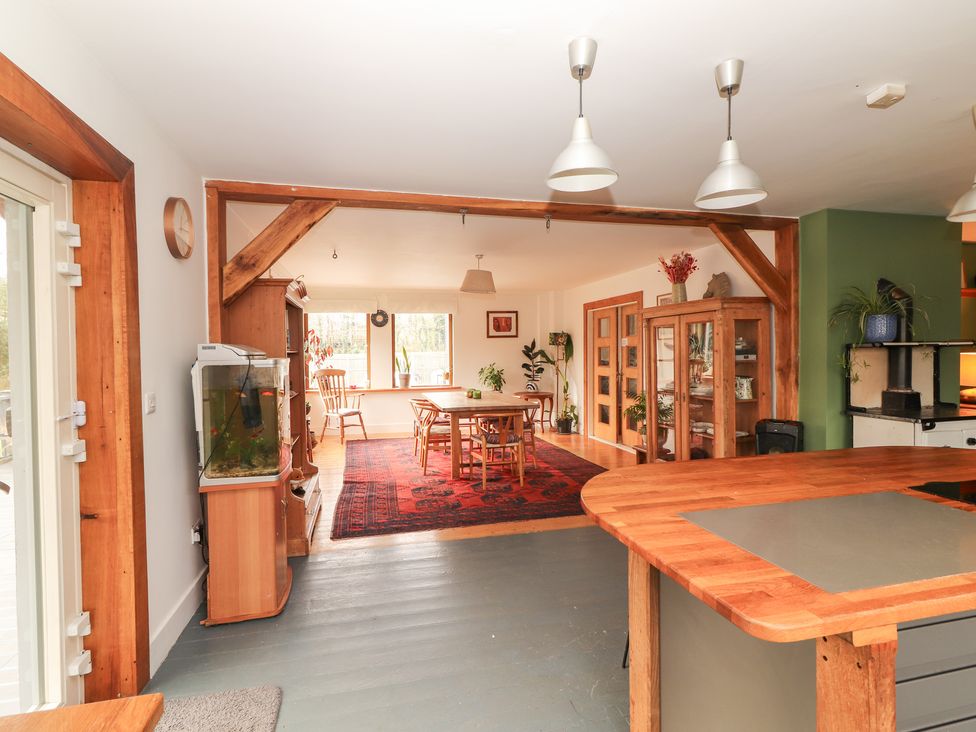 A kitchen with a dining area and a fish tank at Shanti Gher in Bantry