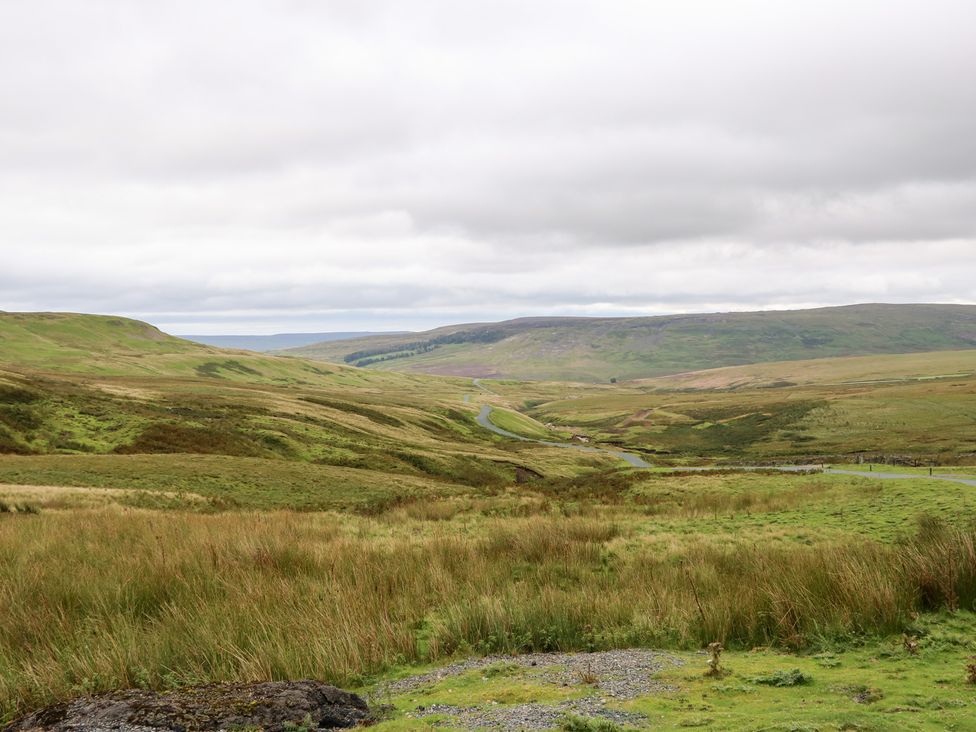 A landscape view of hills and a winding road at Nick Jone in Richmond