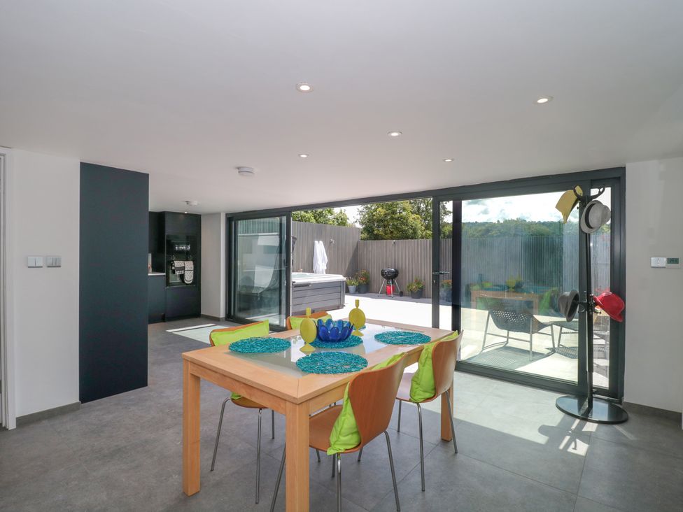 A dining room with a table and chairs at Number 7 in Bishop Sutton
