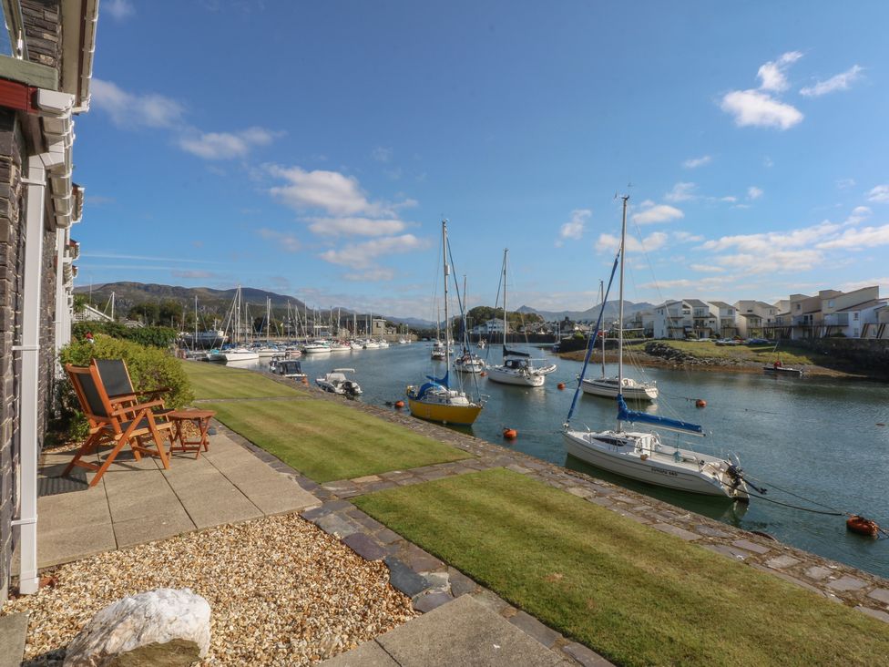 An outdoor area with boats in the water at 1 Oakley Wharf Porthmadog