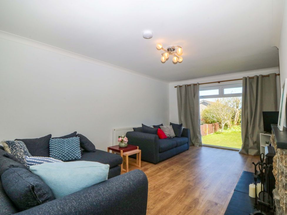 A living room with sofas and a coffee table at 20 Gwelfor Estate Cemaes Bay