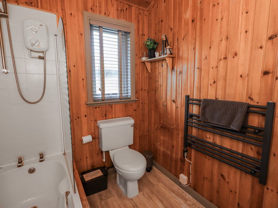 A bathroom with shower and toilet at Fig Tree Lodge in Hutton Roof near Penrith