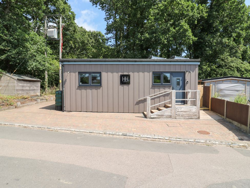 A building with steps and windows at Hub House Three Oaks near Hastings