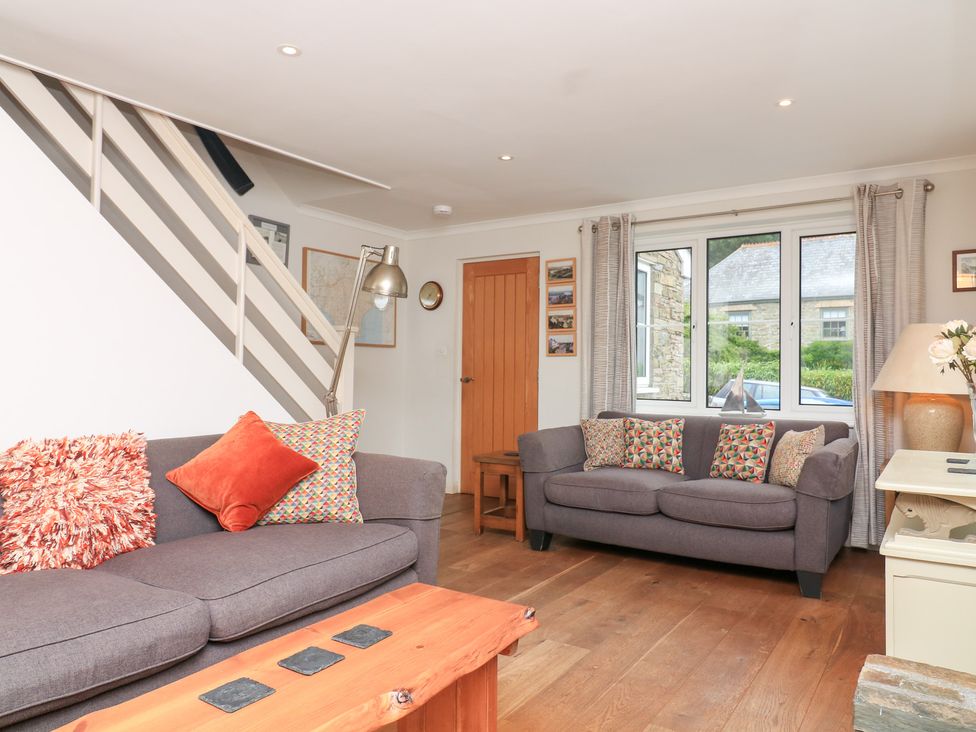 A living room with sofas and a coffee table at Eydon in Salcombe