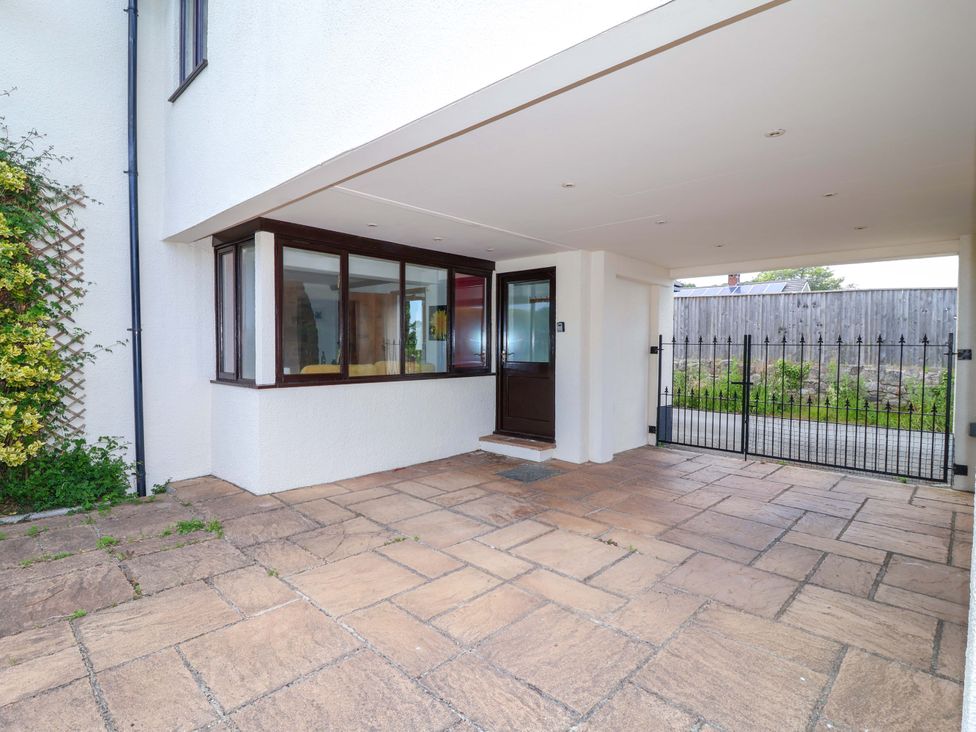 An outdoor area with a door and window at 1 Eastdon Cottages Exeter