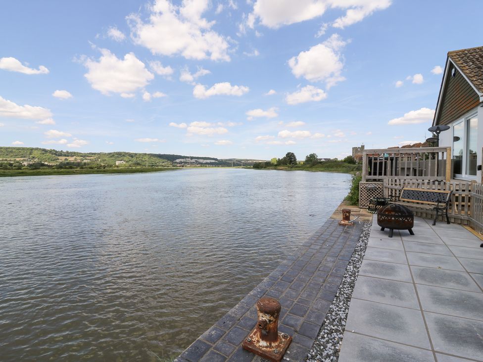 An outdoor area with a river view at Haymens Wharf Wouldham