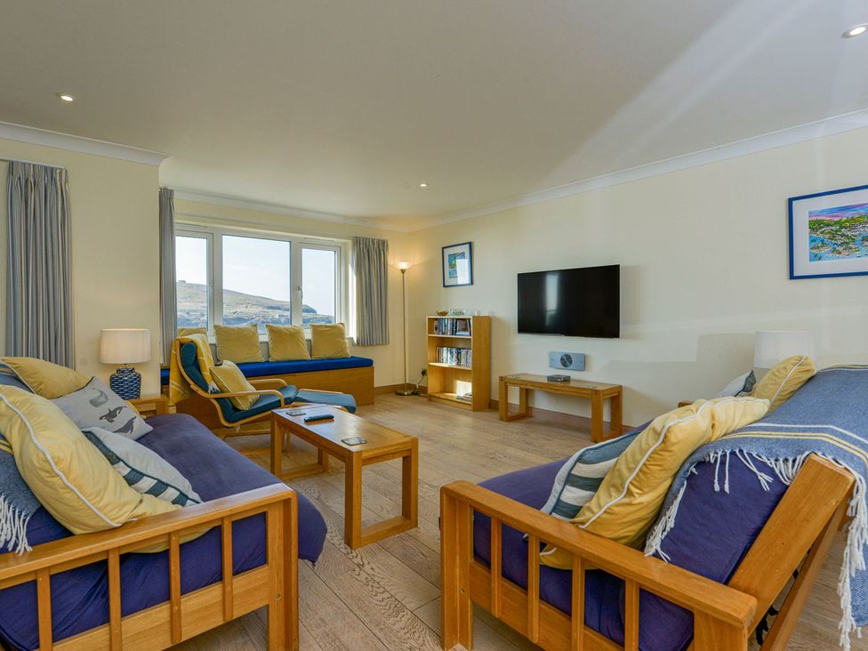 A living room with sofas and a television at Apartment 12, Burgh Island Causeway Bigbury-On-Sea