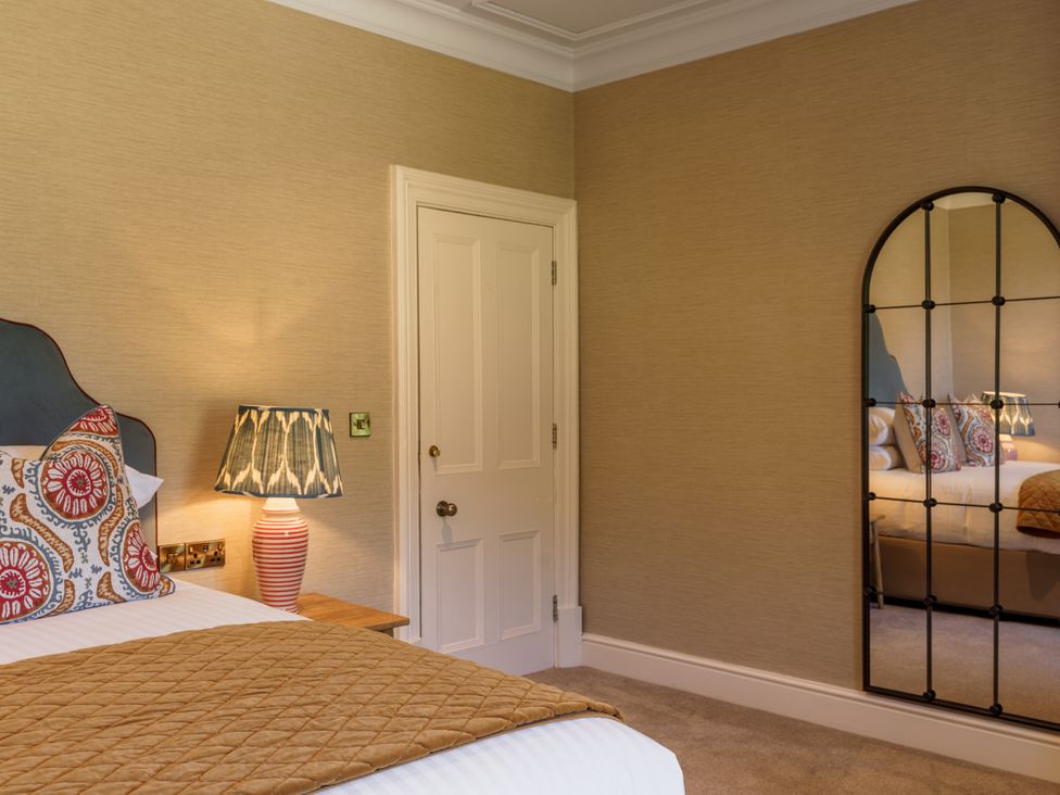 A bedroom with bed and lamp at Leathes Head Country House in Borrowdale near Keswick