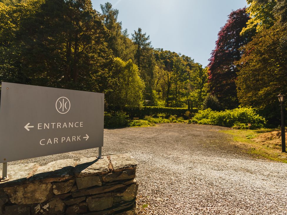 A sign indicating entrance and car park at Leathes Head Country House Borrowdale near Keswick