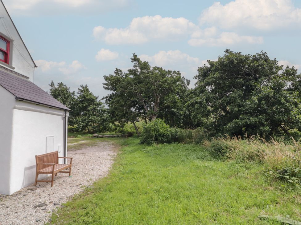 An outdoor area with a bench and path at Shane's Cottage, Falcarragh, County Donegal