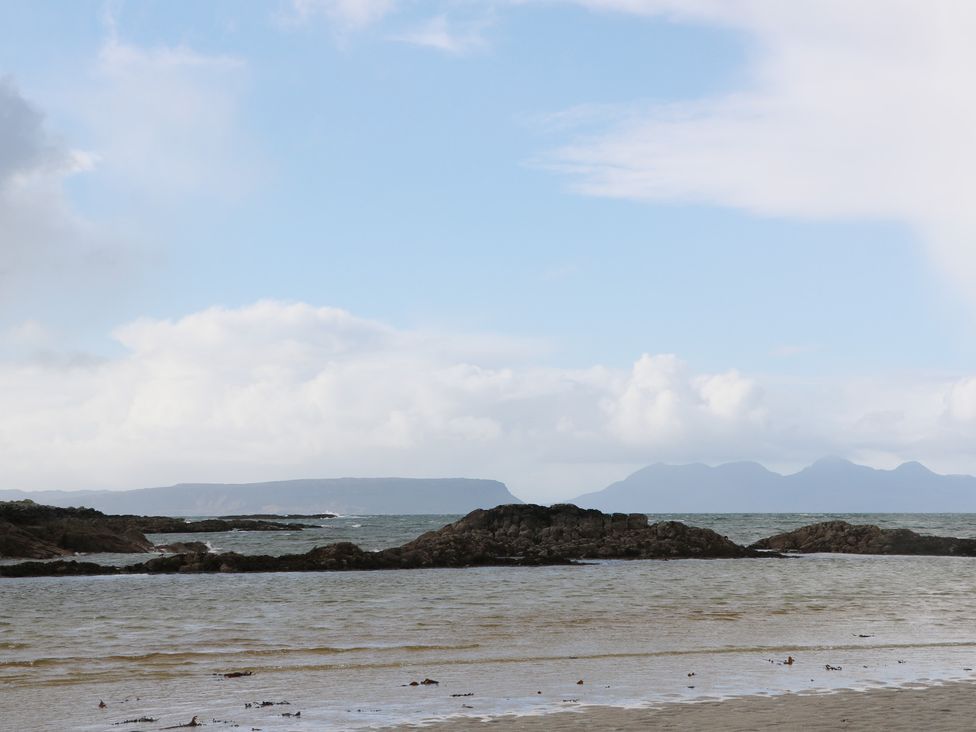 A view of the sea and rocks at Island View Lodge Back of Keppoch near Arisaig