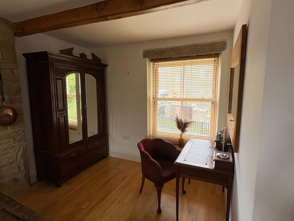 A study with a desk and chair at 12 Queen Street in Keighley
