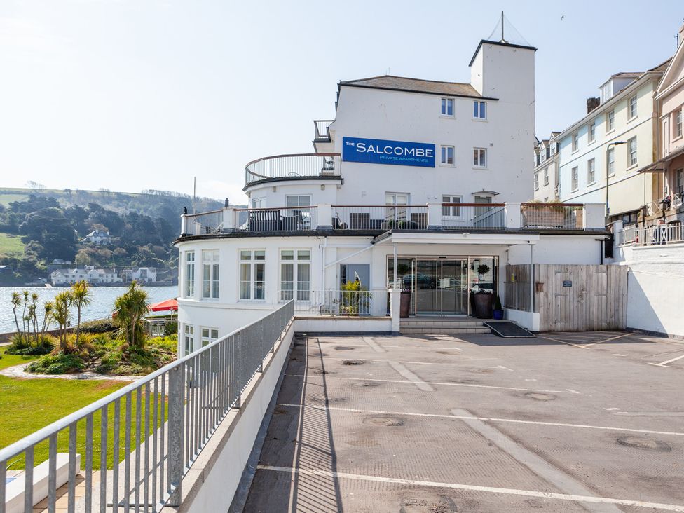 A building with apartments and a sign at 43 The Salcombe in Salcombe