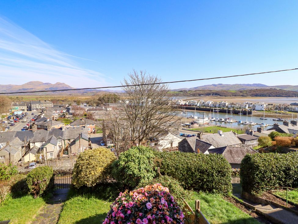 A view of a marina and houses from above at Garth Celyn in Porthmadog