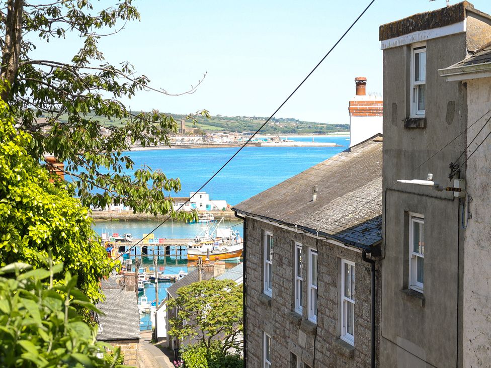 A view of the harbor and buildings at Kittiwake in Newlyn