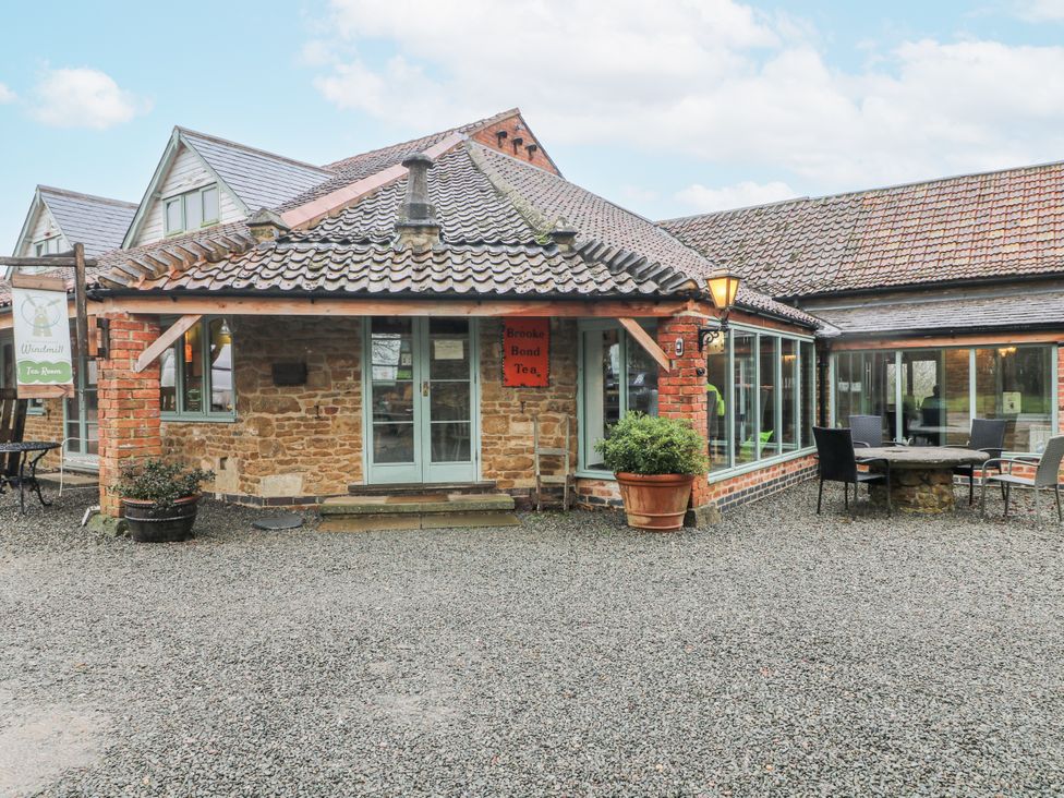 A tea room with outdoor seating at The Walnut Room - Windmill Country Retreats Wymondham near Buckminster