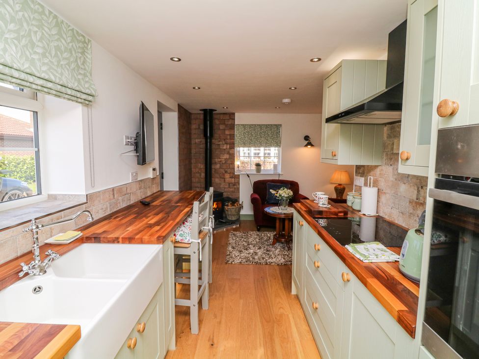 A kitchen with a sink and counter at Frog Leap in Scunthorpe