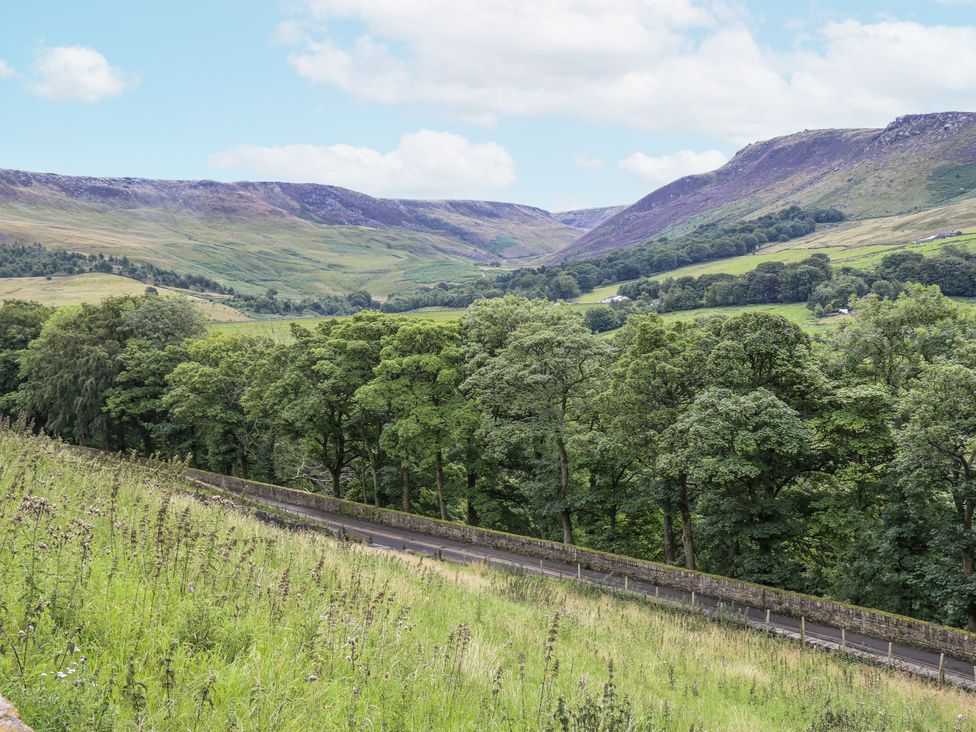 A landscape with mountains and trees at Court Street Cottage Uppermill