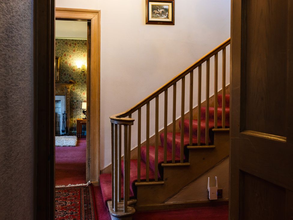 A staircase in a hallway at Cheviot Manor in Akeld near Wooler