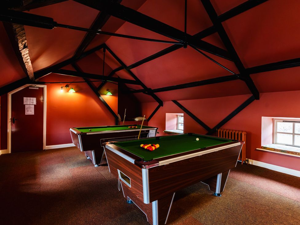 A games room with two pool tables at Cheviot Manor Akeld near Wooler