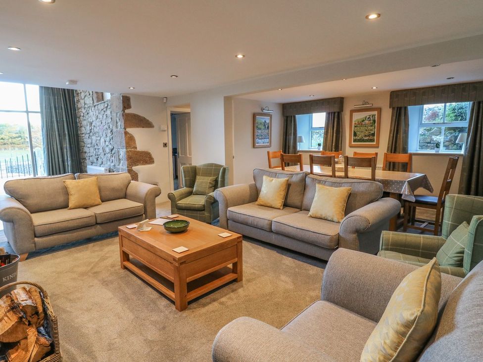 A living room with sofas and a coffee table at Fogga Croft in Skipton