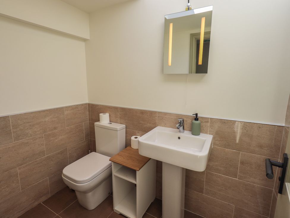 A bathroom with a sink and toilet at Fogga Croft in Gargrave