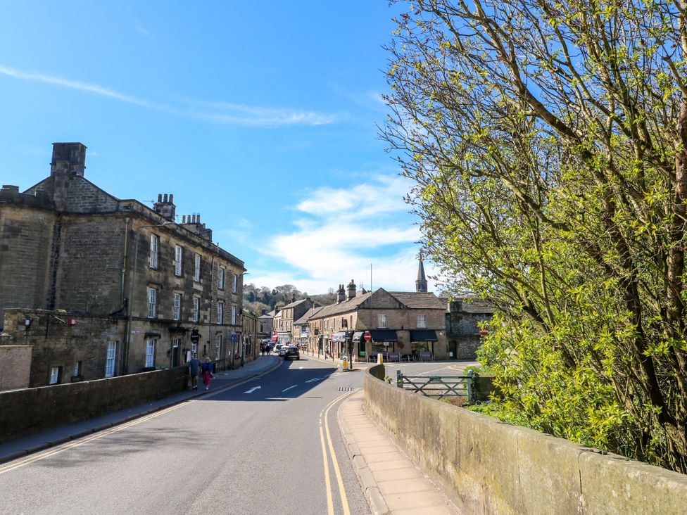 A street scene with buildings and trees at 2A Water Street in Bakewell