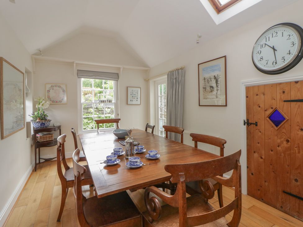 A dining room with a table and chairs at Ty Clyd in Newport, Pembrokeshire