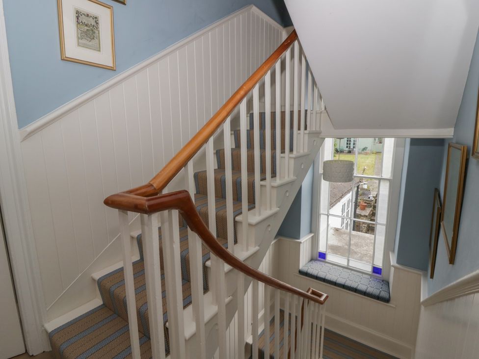 A staircase leading to an upper floor at Ty Clyd Newport, Pembrokeshire