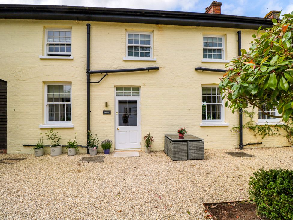 An outdoor area with a door and windows at Beech in Newbury