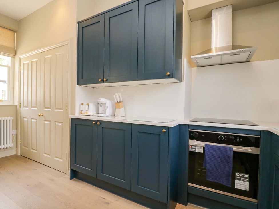 A kitchen with cupboards and appliances at Beech in Newbury