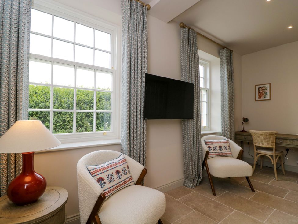 A study with a desk and two chairs at Hazel in Elcot near Kintbury