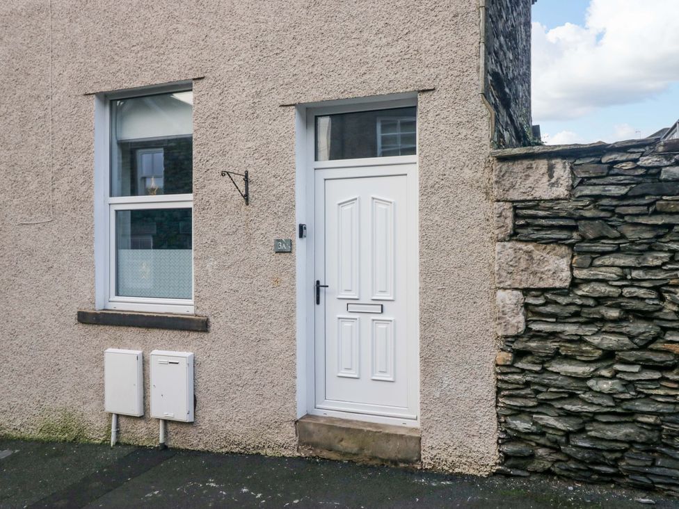 A door and window on an exterior wall at Havelock Hideaway in Windermere