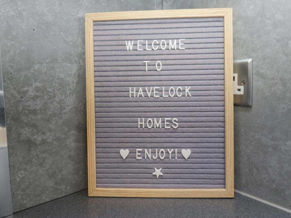 A letter board with welcome messages at Havelock Hideaway in Windermere