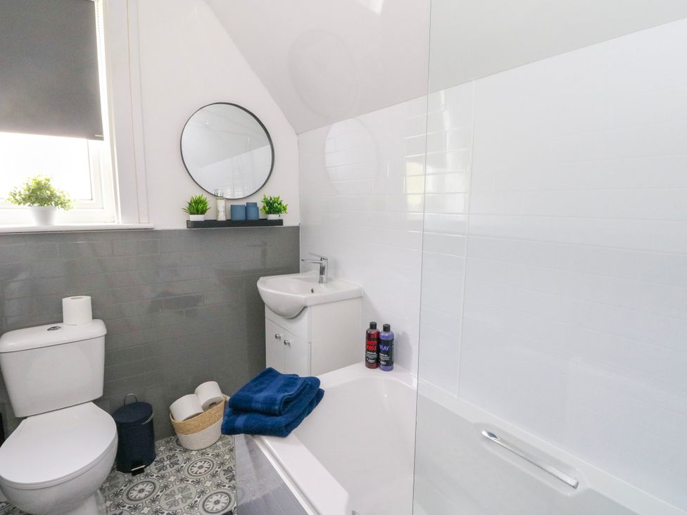 A bathroom with a sink and toilet at 3 Whin Bank Clachan-Seil near Balvicar Isle Of Seil