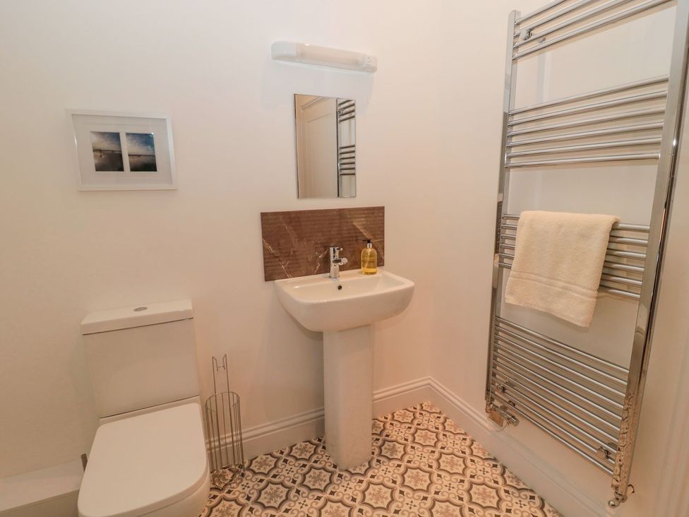 A bathroom with a sink and toilet at Harvest Cottage 1 in Berwick-upon-Tweed