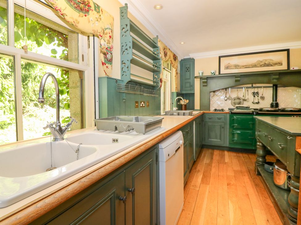 A kitchen with a sink and dishwasher at Claybockie near Braemar