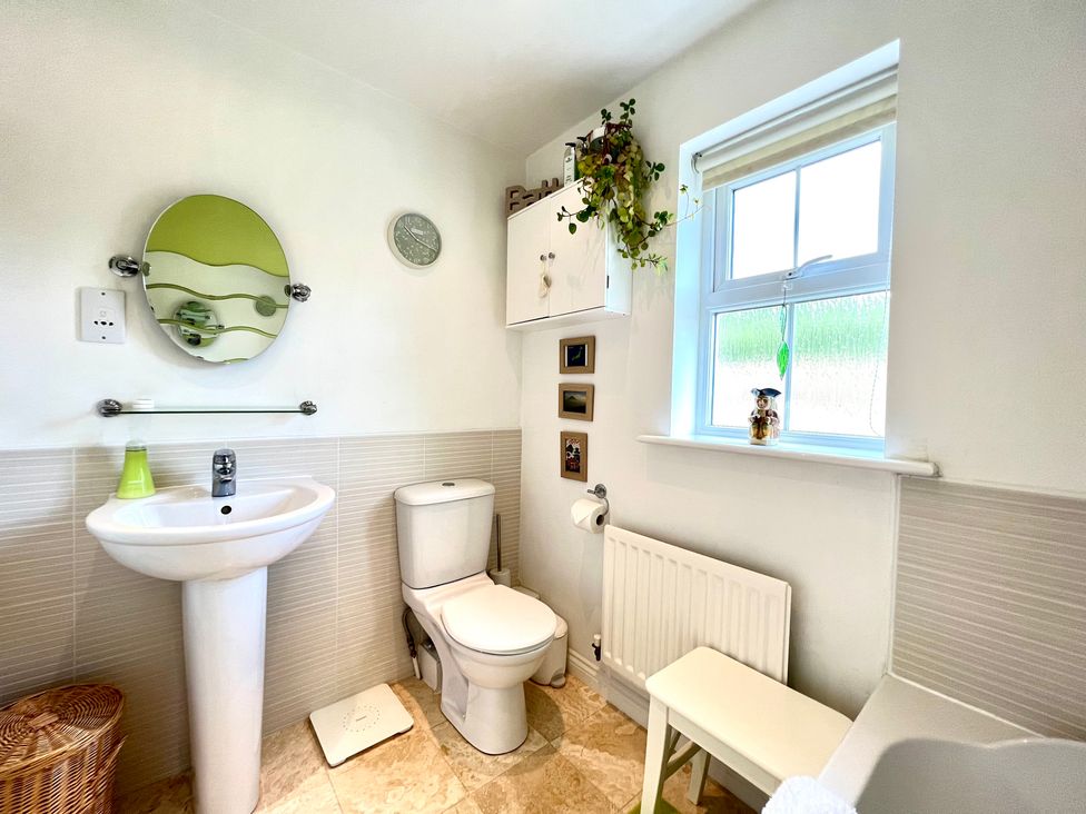 A bathroom with a sink and toilet at Harefield in Rothbury