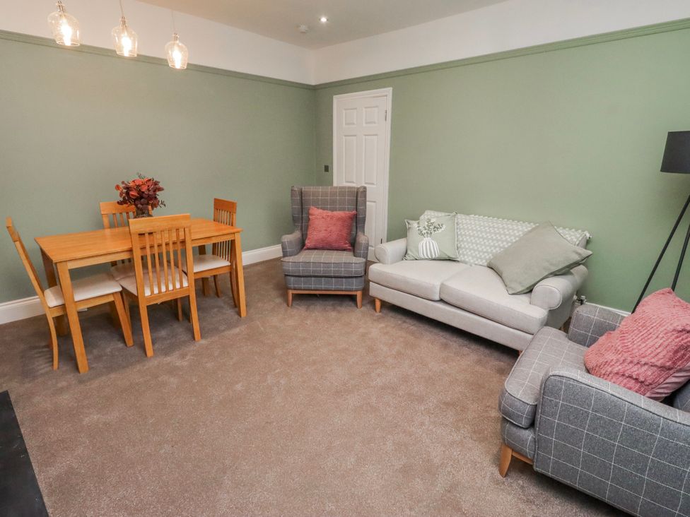 A living room with a dining area at 3 Lisburn Street Alnwick