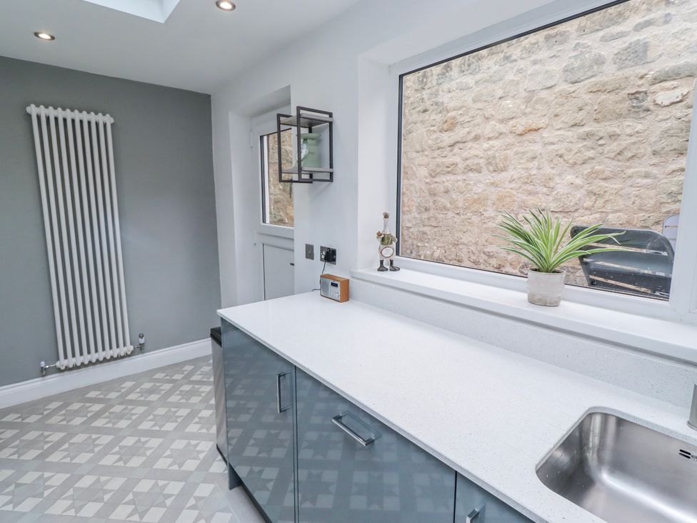 A kitchen with a sink and countertop at 3 Lisburn Street in Alnwick
